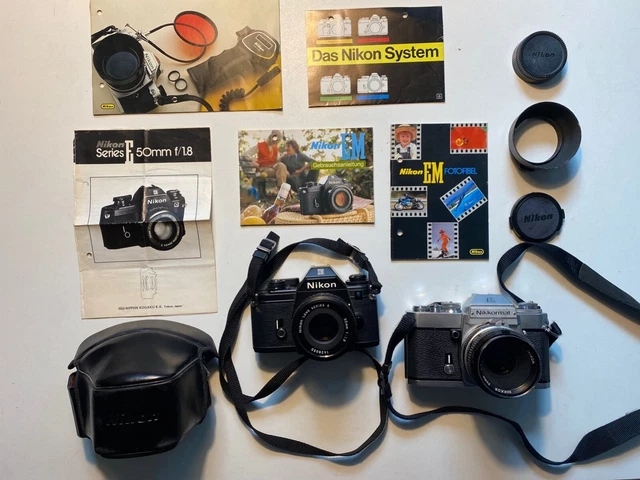 Zwei Nikon analoge Spiegelreflexkameras Nikon EM und Nikkormal EL