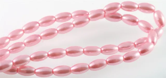 Perle à base de verre, 1 brin (52) rose foncé 7 x 4 mm-8 x 4 mm ovale avec trou de 0,8 mm* 2