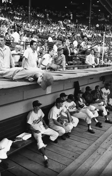 Brooklyn Dodgers Jackie Robinson sits in the locker room vs St. Lo - Old Photo