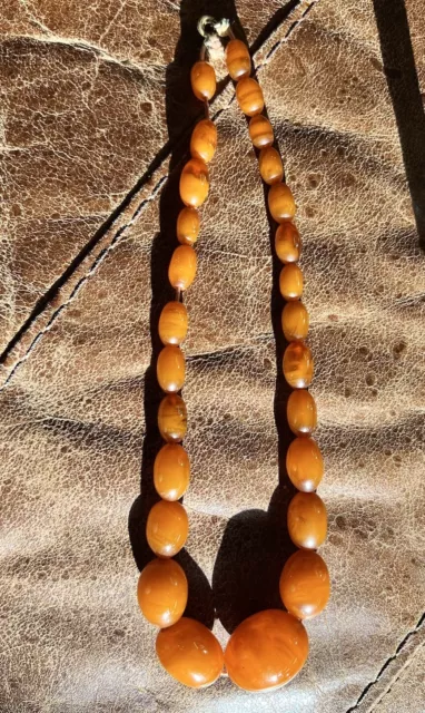 Large Super Quality 20th Century Chinese carved Amber Necklace