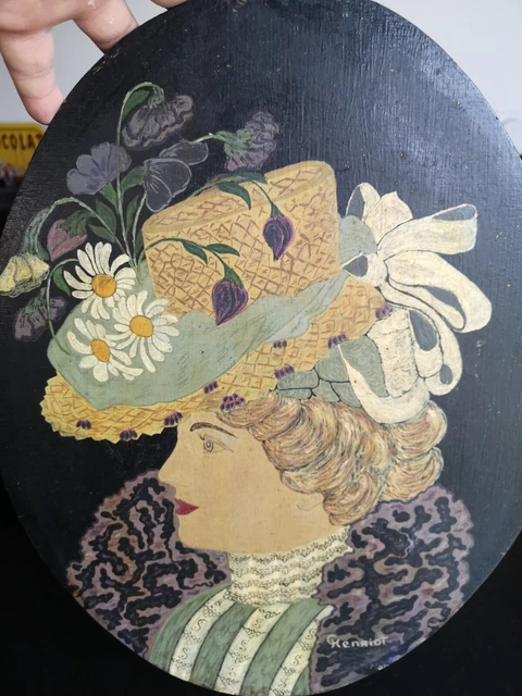 tableau huile sur panneau HENRIOT FEMME AU CHAPEAU a identifier?