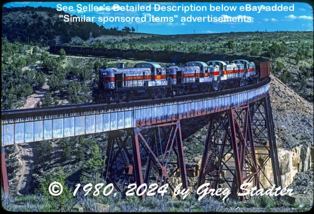 UTAH Railway #302 leads 4 ALCO RSD-4s over Holcomb Creek Trestle, UT (1980)