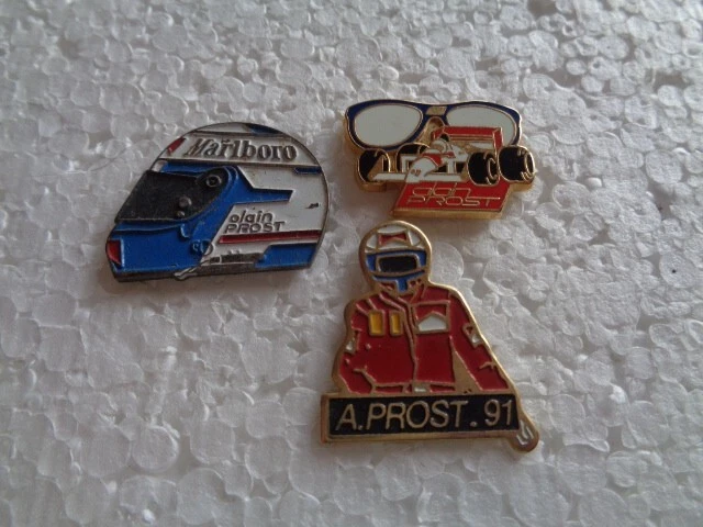 Job lot of 3 Alain Prost F1 racing driver related vintage metal lapel pins