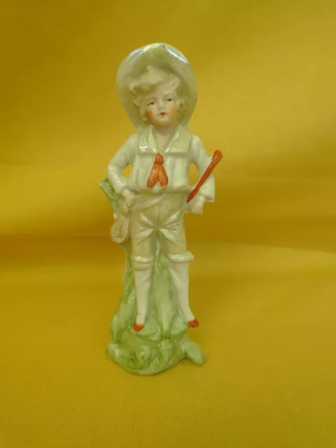 Statuette garçon en porcelaine vintage