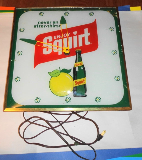EXTREMELY RARE Squirt Soda Clock Lighted and Works Great