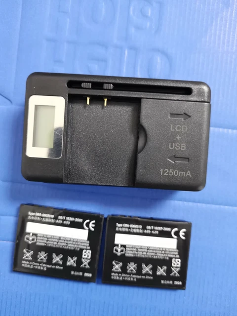 Sony BST-39 Battery AND universal charger for T707 W380 W380a W518 W518a W908c