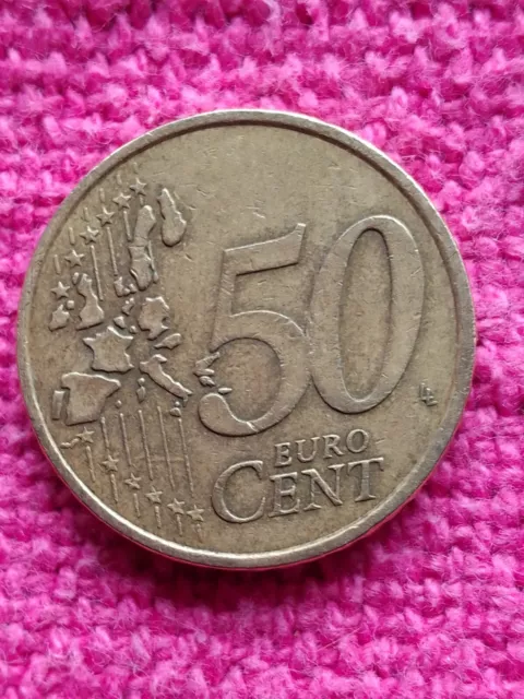 Dos monedas de España una de 50cents de Grecia y una de Francia de 10 cents