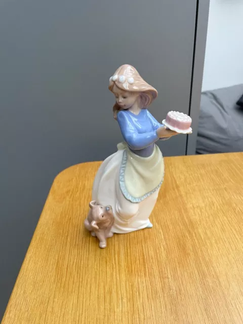 Nao Lladro Figurine - Girl with puppy and cake - Excellent condition