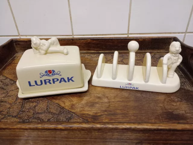 Lurpak Pair. Butter Dish And Toast Rack. Both With Douglas The Butter Man.