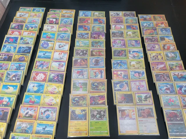 POKEMON CARDS x50 - Holo Rare x1 + Rev Holo x10 + Rare x6 + Assorted cards x33