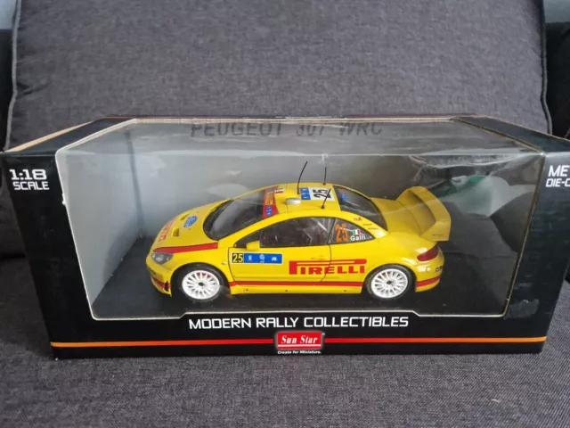 Miniature Voiture Collection 1 18 Peugeot 307 Wrc Rallye Pirelli Galli Sunstar