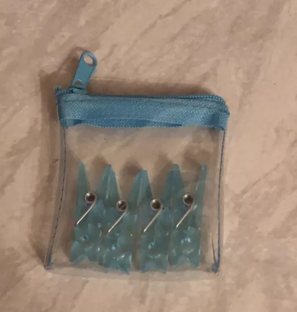 C12. Tiny 2.5” Blue Plastic Zip Case Containing x4 Blue Mini Plastic Clip Pegs