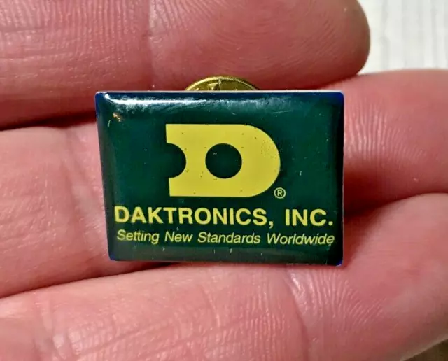 Daktronics, INC. Setting New Standards Worldwide Advertising Lapel Hat Bag Pin