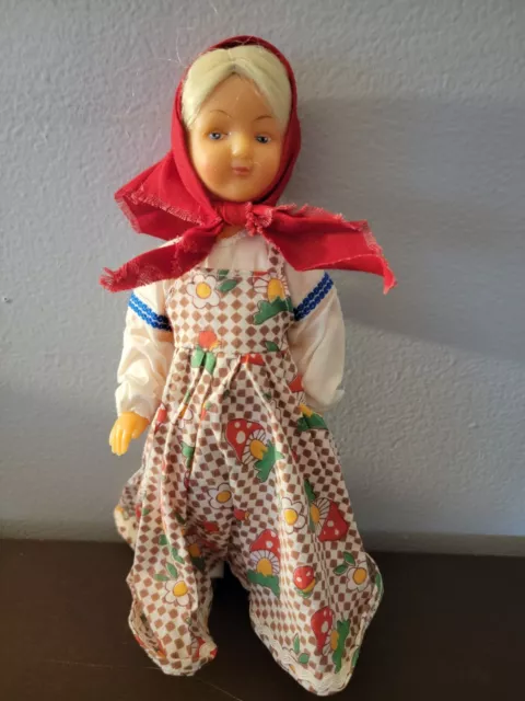 Vintage 11.5" Peasant Russian Plastic Doll In checker dress Made in Russia