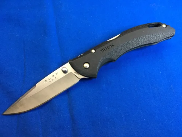 Benchmade Redoubt AXIS Part Serrate 430SBK @ SRKT Cobalt Black/Gray  Cerakote Coated CPM D2 Partially Serrated Drop Point Combo Blade Gray and  Green Grivory Handle Scales Manual Dual Thumb Stud Folding Pocket