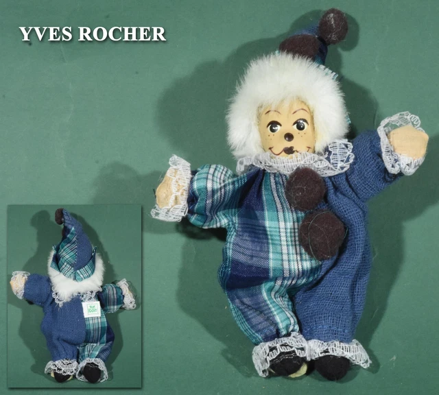 Poupée En Céramique De Porcelaine De Clown Triste Sur Le Blanc Photo