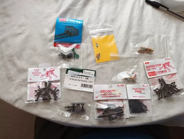 A Model Small Joblot Of 10 Pkts Of Accessories In N Gauge By Mixed Makers