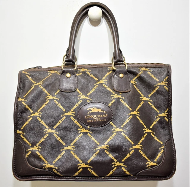 Longchamp, Sac porté main, en cuir marron ébène monogrammé, vintage