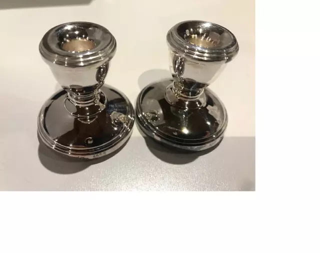 A pair of small 1.75 inch candlesticks silver plated
