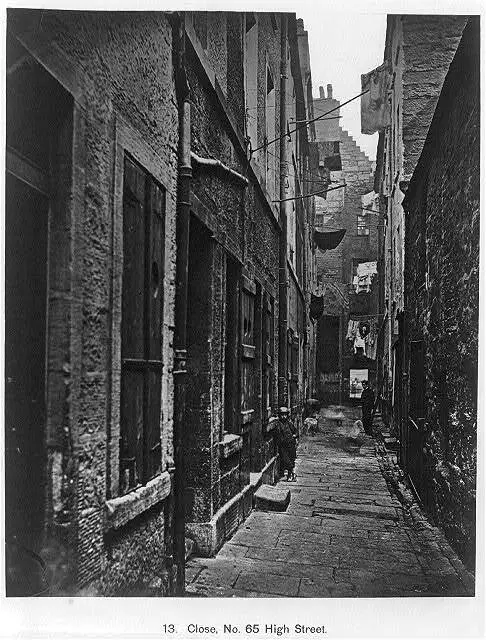 Close,no. 61 High Street,alley scene,Glasgow,Scotland,barefoot boy,camera,c1870