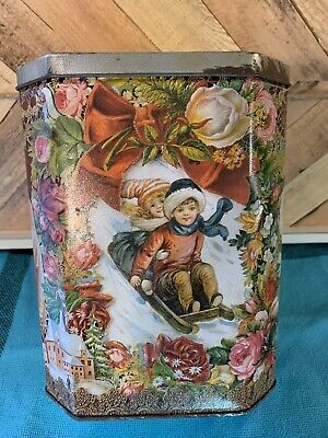 Vintage Christmas Tin with roses and late Victorian scenes of the Holidays