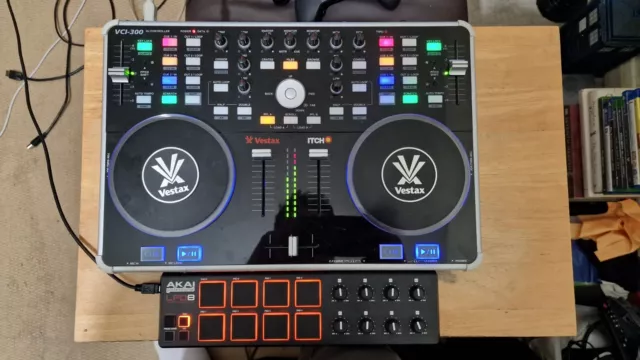 Vestax VCI 300 (unlocks Serato DJ Pro) and Akai LPD8