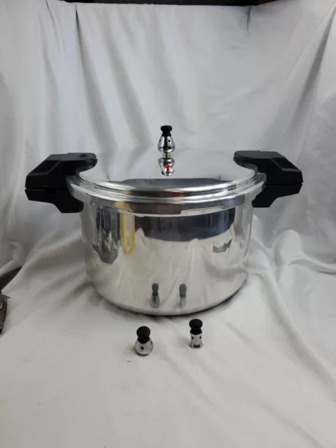 https://www.picclickimg.com/RYsAAOSw-cNi-8kv/Mirro-Polished-Aluminum-Pressure-Cooker-16-qt-model.webp