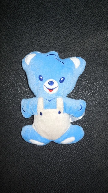 doudou peluche ours bleu NESTLE