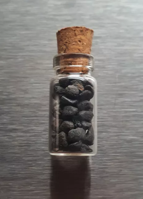 Lot of crust mid-size Chelyabinsk meteorite. In a  present bottle.