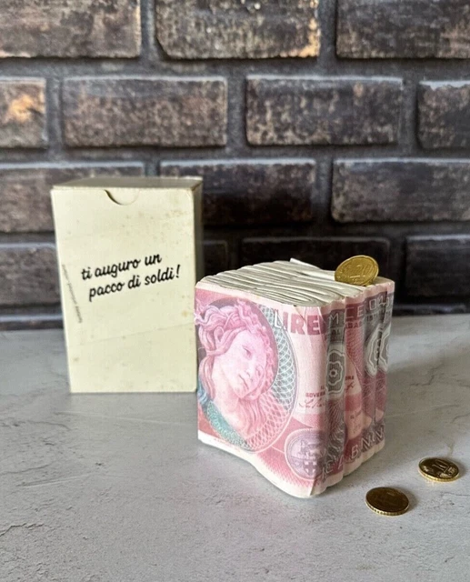 Salvadanaio con foro apribile in confezione originale. 