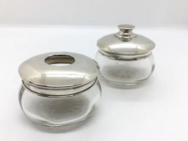 Two 1920s sterling silver topped glass dressing table hair tidy & storage jar