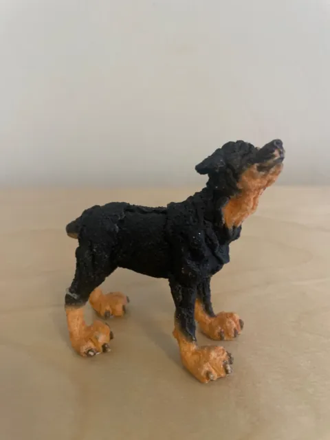 A breed apart Rottweiler dog figurine repaired leg