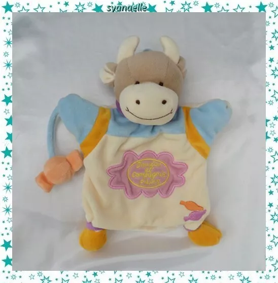 Doudou Plat Marionnette Vache Bonbons Blanc Rose Bleu Orange Doudou Et Compagnie