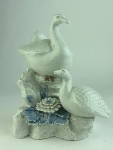 Japanese Hiraldo porcelain figurine of ducks with a water plant. Meiji period.