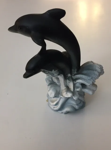 Dolphins Pair Riding Wave Jumping And Playing Sculpture/Statue. Blue, White.