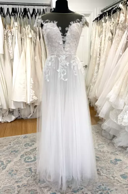Wedding Gown by Tadashi Shoji Size 4. Illusion bateau. A-Line Ivory Tulle Gown