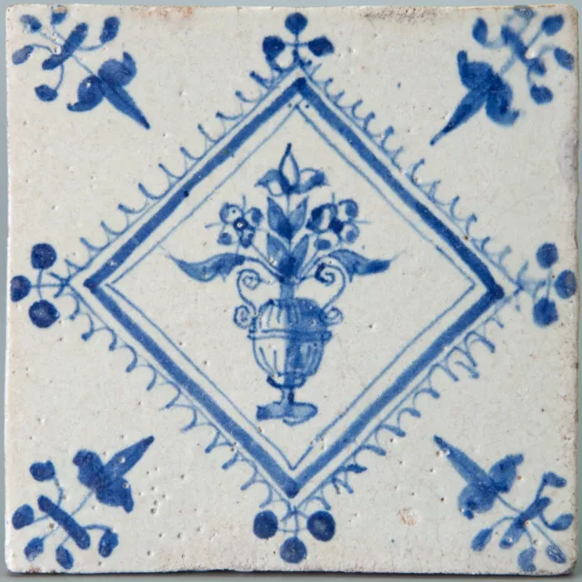 Nice Dutch Delft Blue tile, flowerpot in blue diamond, first half 17th. century.