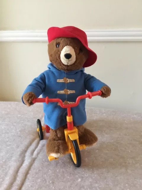 Paddington bear on bike shop