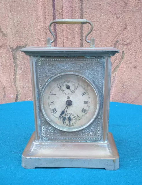 Piccolo Orologio con cassa lavorata incisa, quadrante ore in numeri romani
