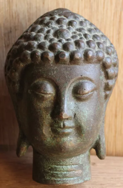 Ancienne tête de Bouddha en bronze