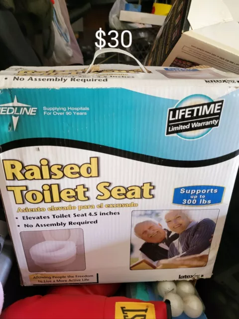 Asiento de inodoro elevado Redline