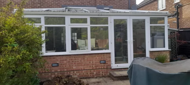 Conservatory white PVC wit glass windows and roof Good condition well maintained