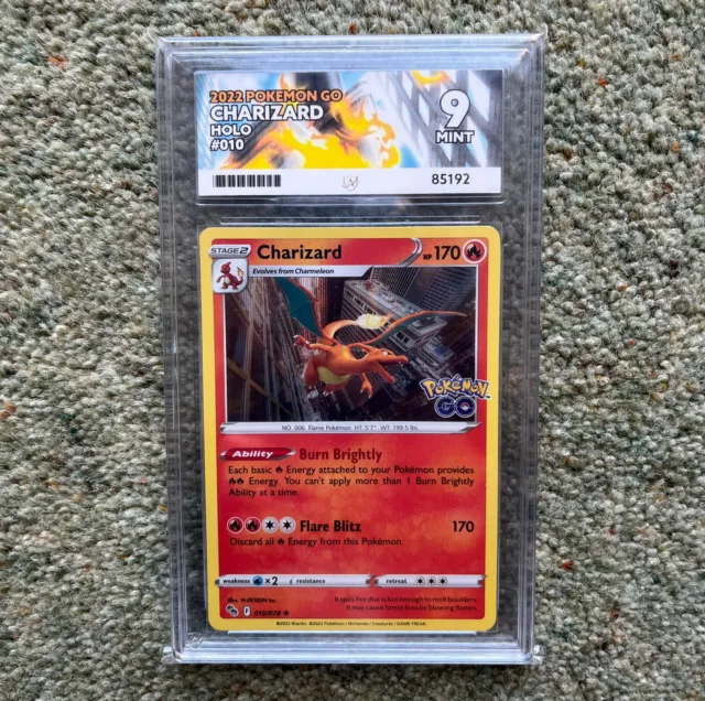 Charizard 010/078 Ass 9 Pokemon GO *NEU PLATTE* Ass Etikett Holo Karte nicht PSA