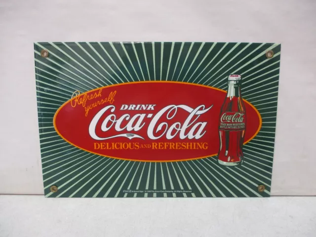 1999 Coca Cola Metal Sign 12x8 Inches