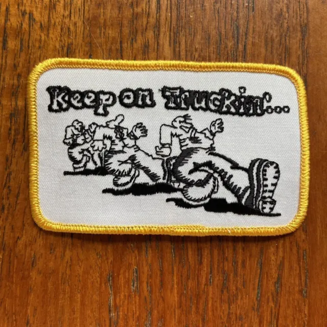 Vintage 80s USA patch Robert crumb cartoon “keep on truckin” sew on badge