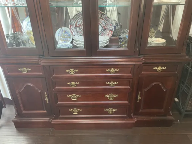 Curio cabinet with glass doors and drawers. Not scratch. Touch hinge Lighting.