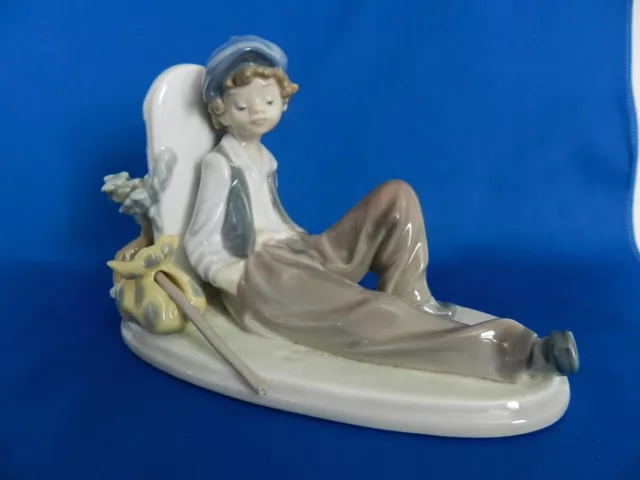 Lladro #5399 "Time to Rest" Hobo Boy With Bindle Fine Porcelain Figurine - MINT