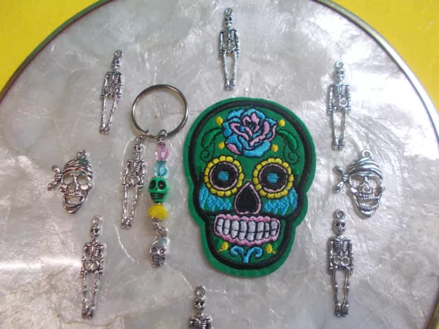 Silver Skull And Skeleton Charms On A Key Ring With A Green Skull Patch # 89 K