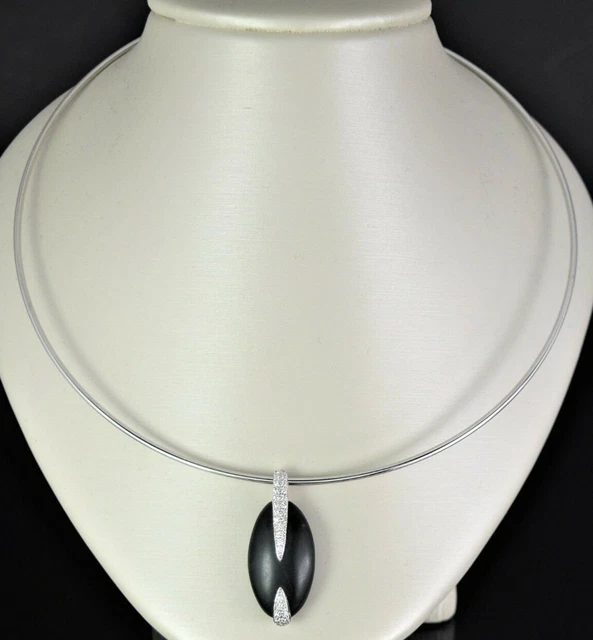 $3,450 Movado Pebble 18K Gold Diamond Black Riverstone Pendant 18" Wire Necklace $3,450 Movado Pebble 18K Gold Diamond Black Riverstone Pendant 18" Wire Necklace