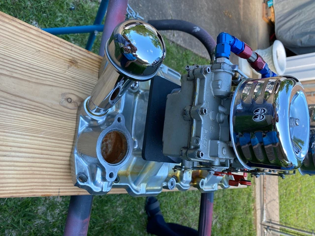 Edelbrock SBC 3 deuce intake manifold, with heat risers under carbs, fuel lines Edelbrock SBC 3 deuce intake manifold, with heat risers under carbs, fuel lines